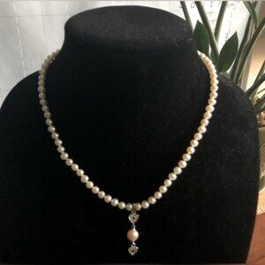 Elegant Vintage Pearl Necklace with Heart Accents